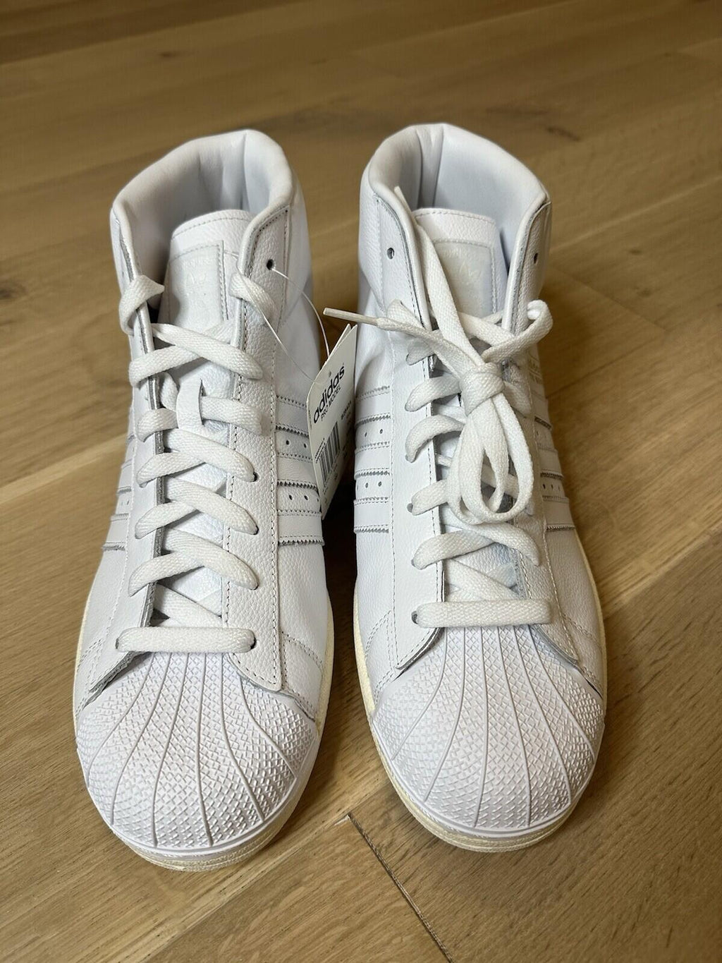 Adidas Pro model FTWWHITE/FTWWHITE/OWHITE Men’s Size 12