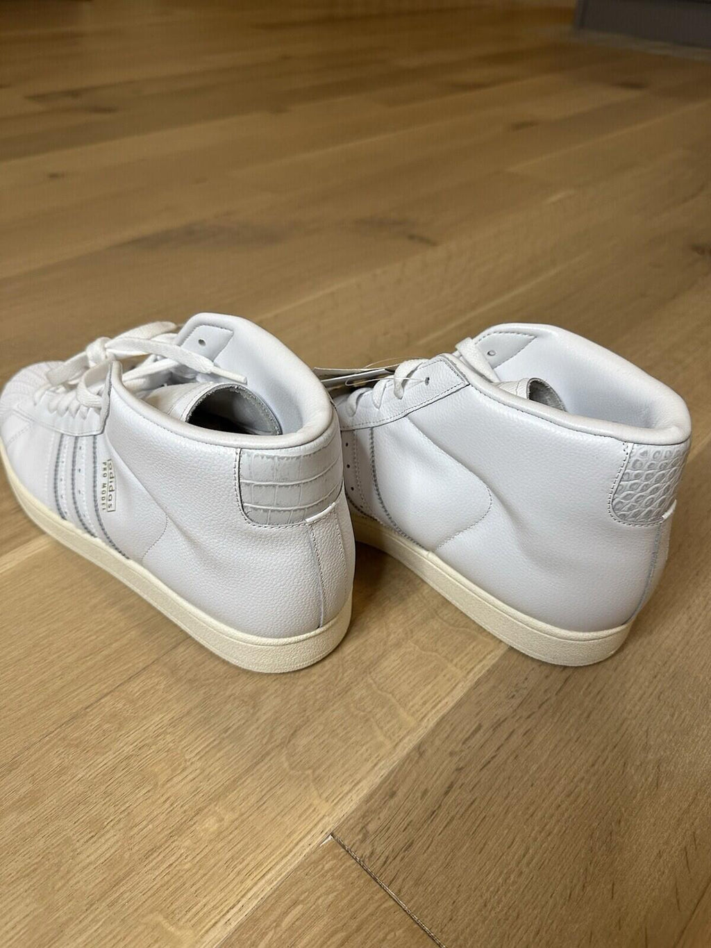 Adidas Pro model FTWWHITE/FTWWHITE/OWHITE Men’s Size 12